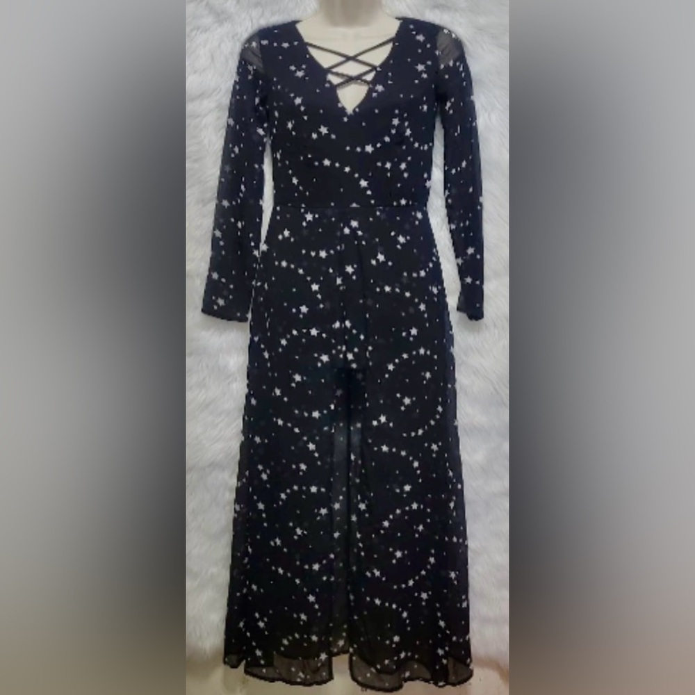 Witchy Vibes Only – Black Mesh Jumpsuit with Star Print & Dramatic Split Front.